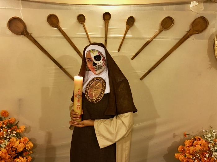 Day of the Dead nun holding candle