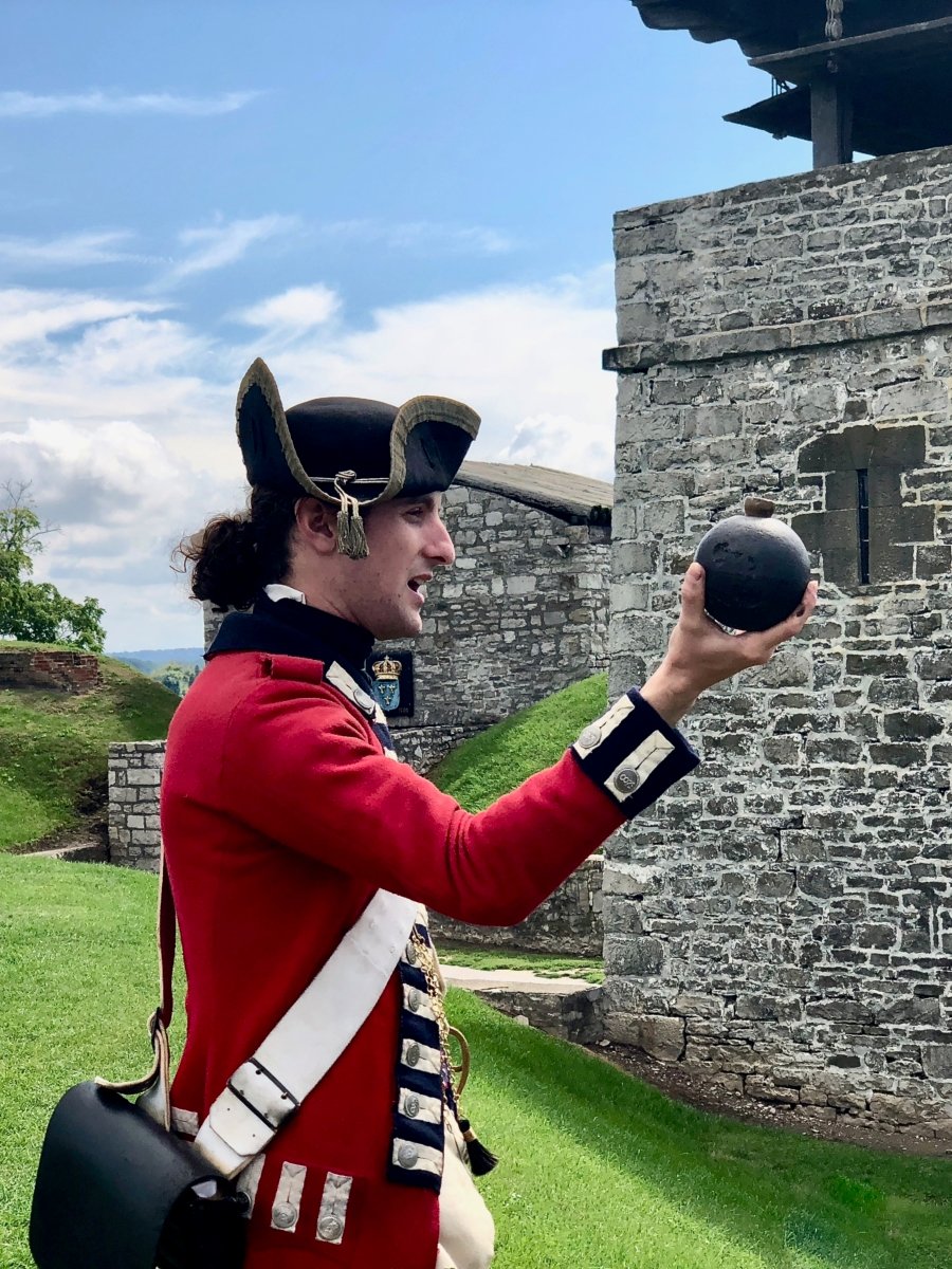 British redcoat holding a cannonball