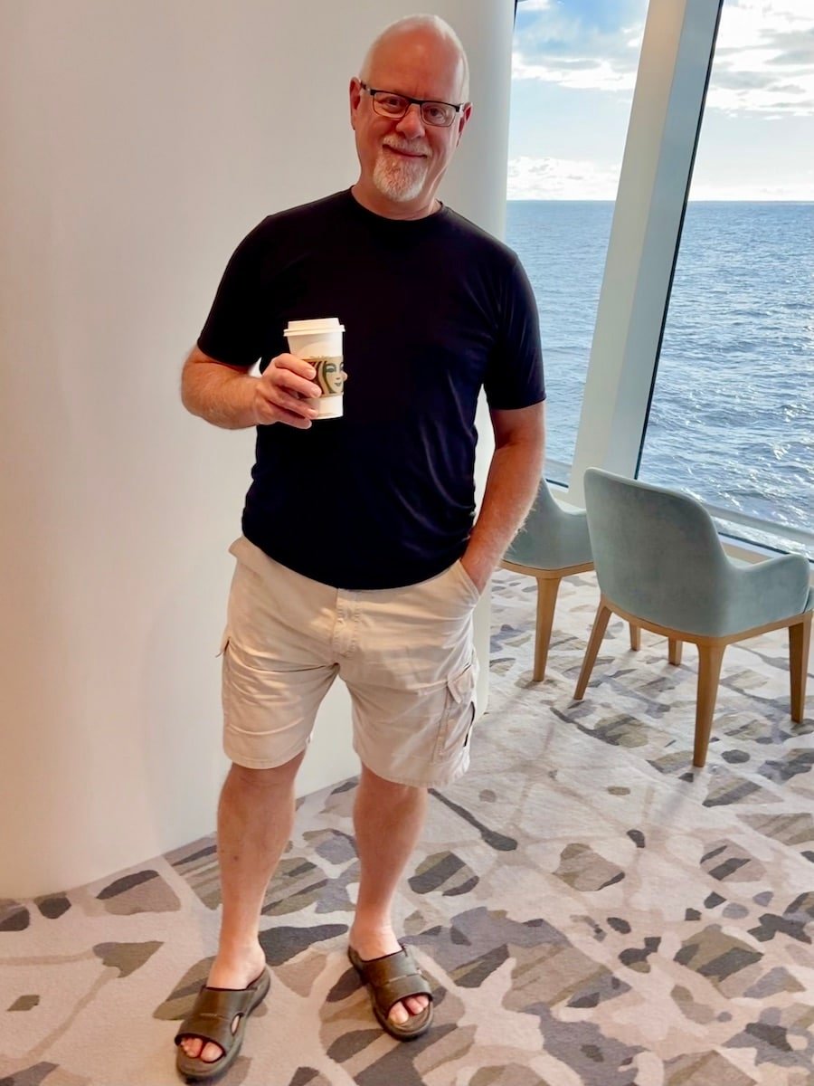 NCL Prima Howard with a Starbucks coffee