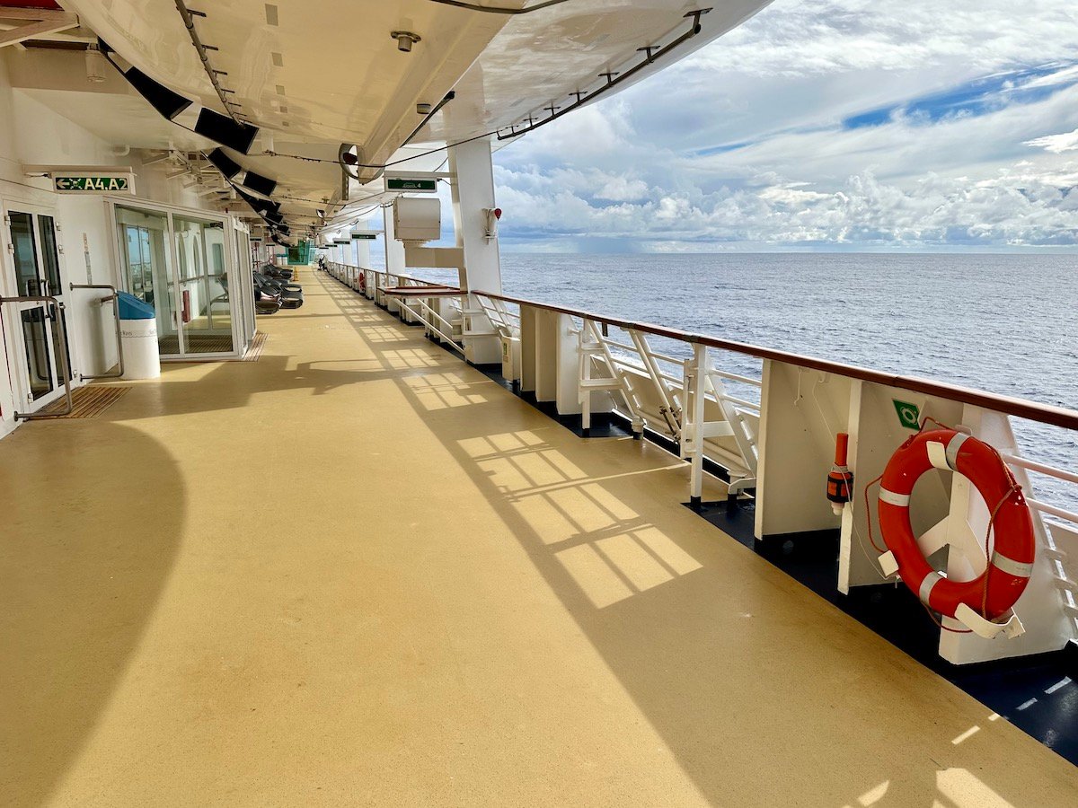 https://backroadplanet.com/wp-content/uploads/2022/12/Brilliance-of-the-Seas-promenade.jpeg